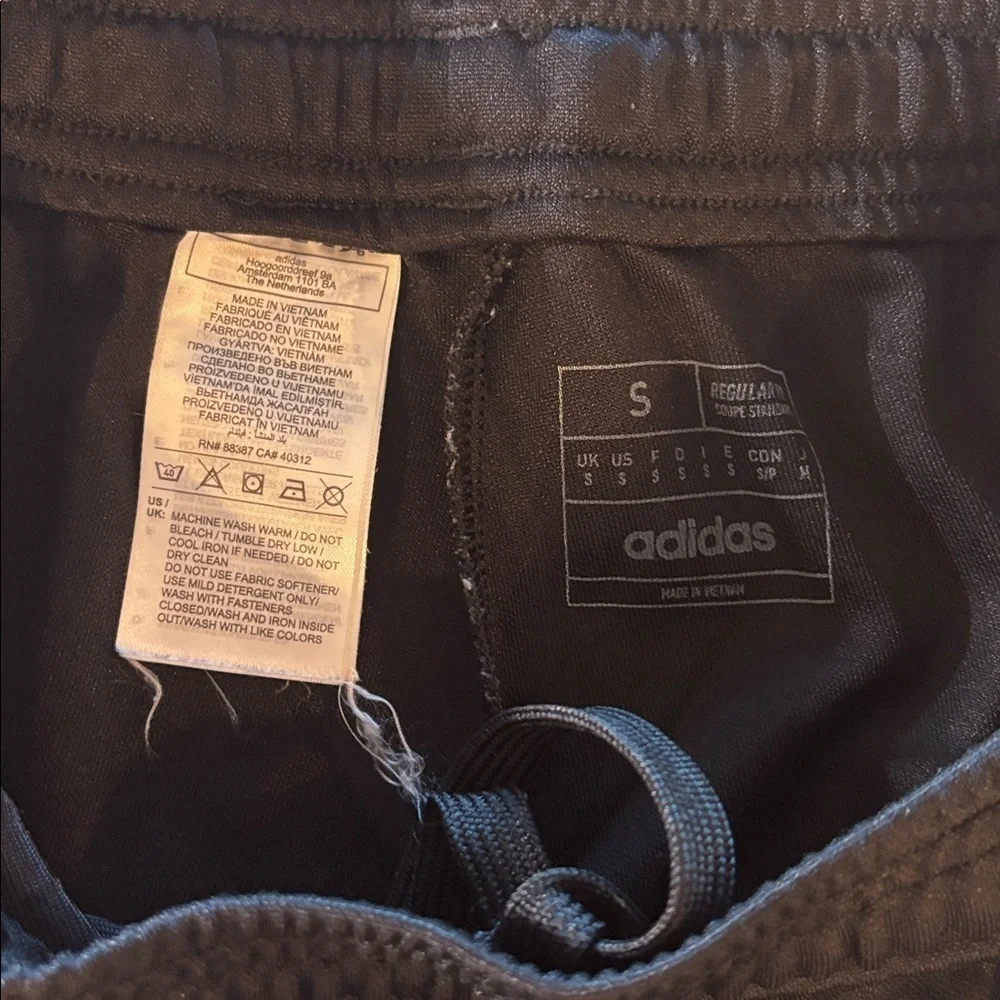 adidas Men's black tiro Joggers, size small